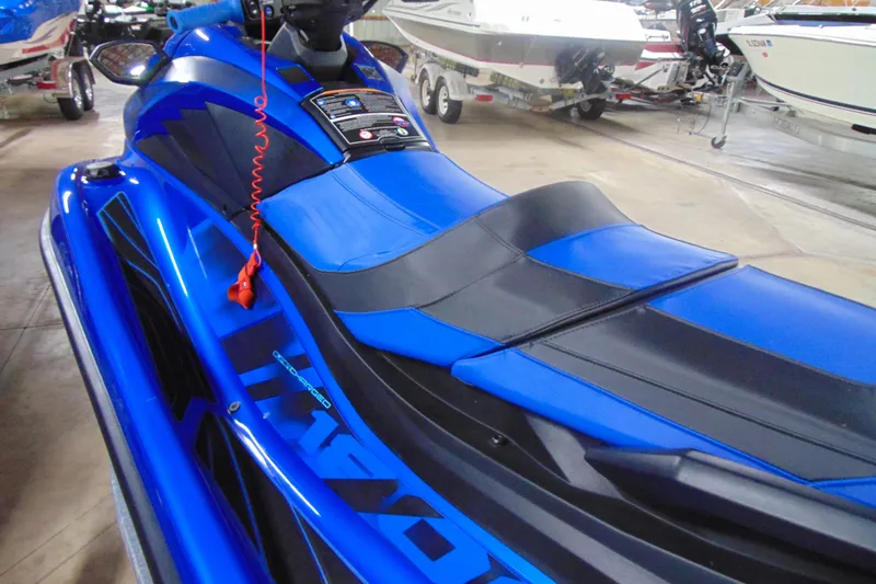 Slide: The Image of 2023 Yamaha WaveRunner GP1800R SVHO in vibrant blue, displayed indoors. - 6