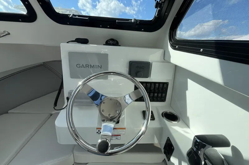 Slide: The Image of Helm of 2026 Parker 227 Explorer boat with Garmin navigation system. - 10