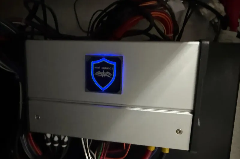 Slide: The Image of Audio amplifier with "Wet Sounds" logo in a 2026 Sylvan L-3 CLZ DH boat. - 23