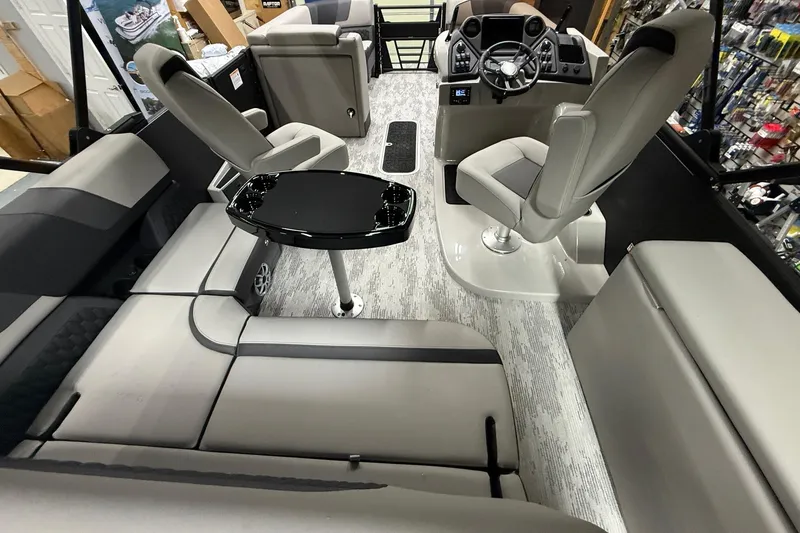 Slide: The Image of 2026 Sylvan L-3 CLZ DH boat interior with modern seating and sleek design. - 5