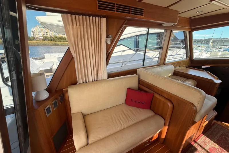 Slide: The Image of Luxurious interior of 2017 Sabre 48 Salon Express yacht with elegant seating and scenic views. - 35