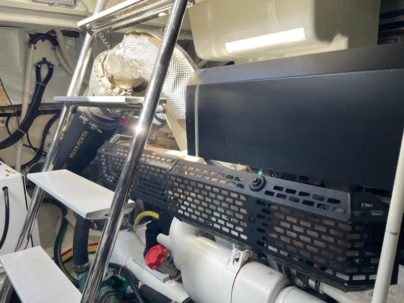 Slide: The Image of Engine room of 2017 Sabre 48 Salon Express with visible components and equipment. - 57