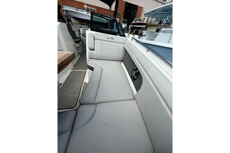 Slide: The Image of 2021 Sea Ray SDX 290 Outboard interior with luxurious seating and modern design. - 28