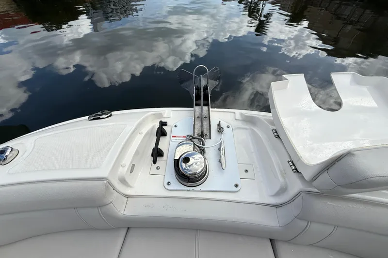 Slide: The Image of 2021 Sea Ray SDX 290 Outboard boat anchor system on calm water. - 29