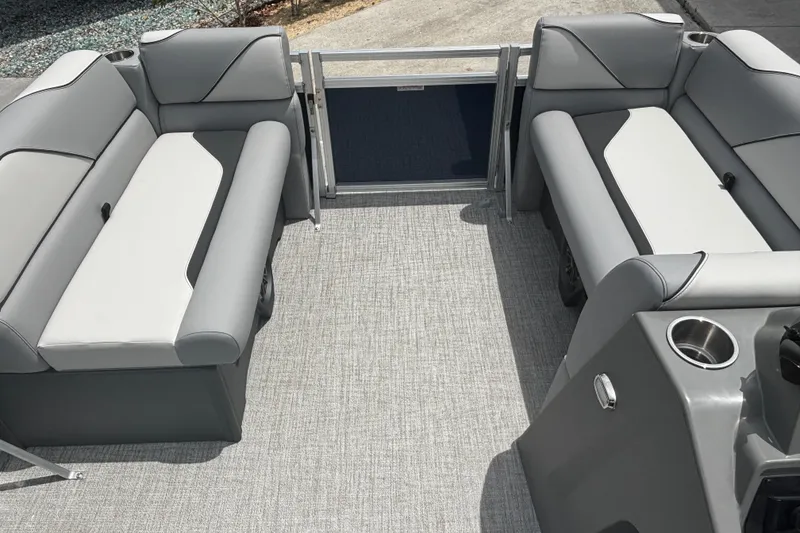 Slide: The Image of 2026 Tahoe Pontoon 1780 interior with gray seating and cup holders. - 8