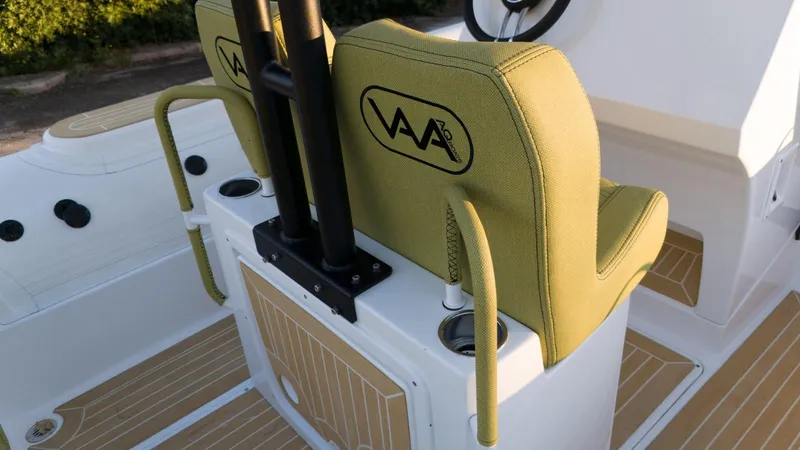 Slide: The Image of 2025 Aqvaboats Luxrib 25 interior with green seats and modern design. - 15