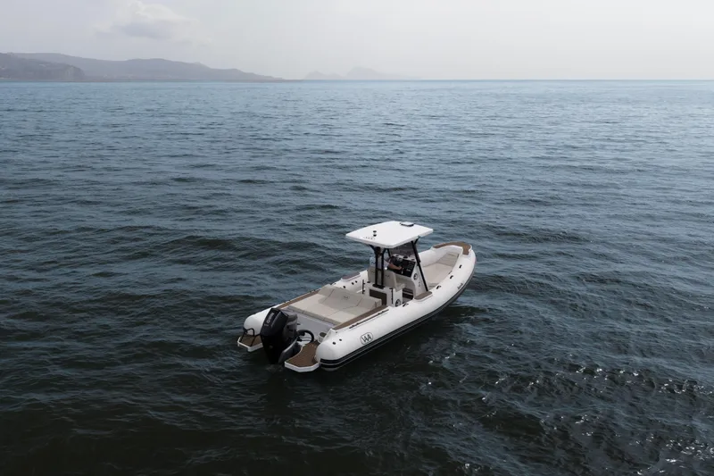 Slide: The Image of Aqvaboats Luxrib 25 (2026) cruising on calm ocean waters. - 27