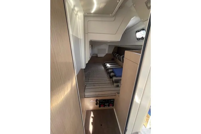 Slide: The Image of Interior of 2022 Beneteau Oceanis 35.1 sailboat, featuring cozy cabin and modern design. - 3