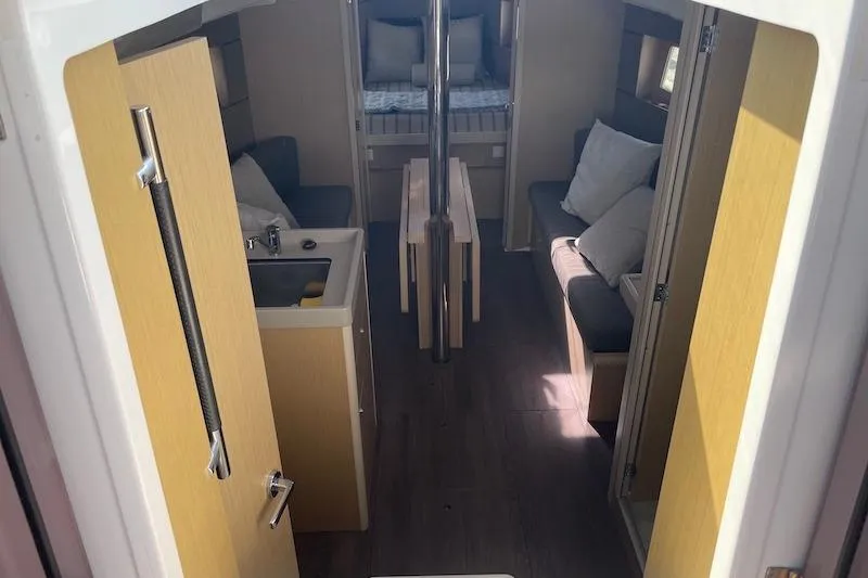 Slide: The Image of Interior of 2022 Beneteau Oceanis 35.1 yacht, featuring cozy seating and modern design. - 8