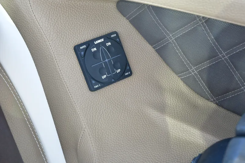 Slide: The Image of 2016 Cobalt 336 interior with Lenco control panel on beige leather. - 10