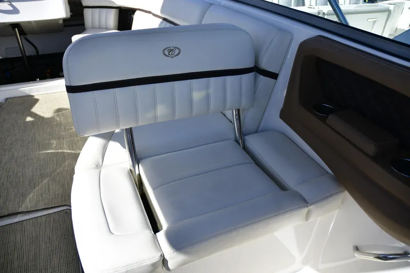 Slide: The Image of Luxury seating on a 2016 Cobalt 336 boat, featuring white upholstery and sleek design. - 11