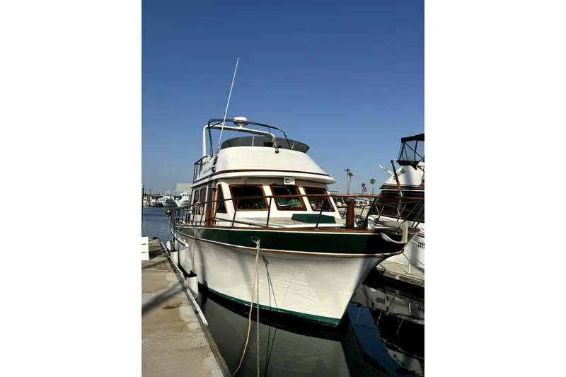Slide: The Image of 1985 PT Boats PT 38 Aft Cabin docked under clear blue sky. - 2