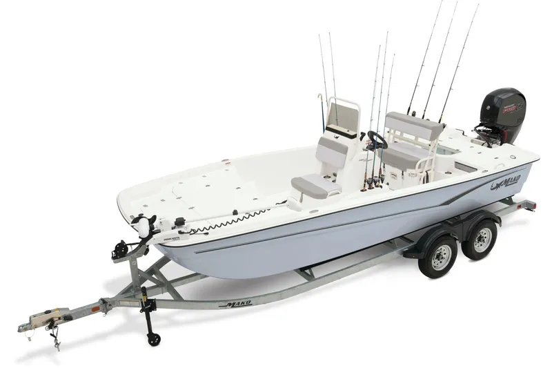 Slide: The Image of 2026 Mako Pro Skiff 19 CC boat with Mercury engine on trailer. - 2