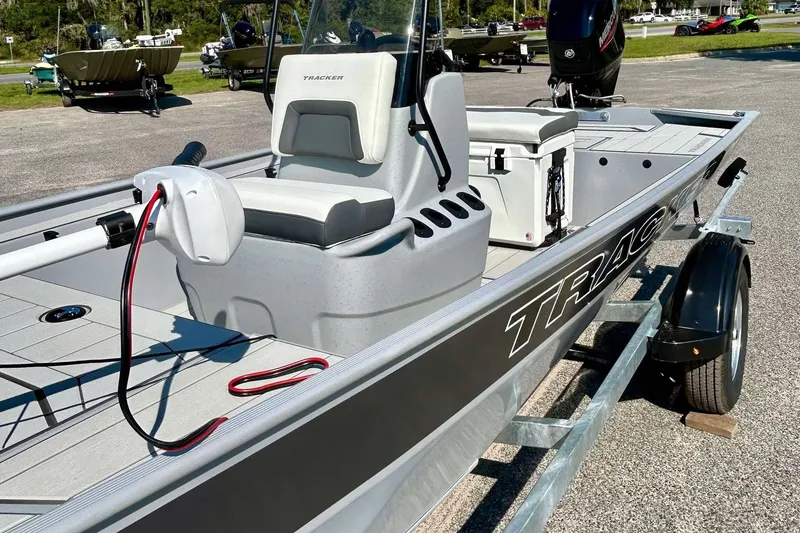 Slide: The Image of 2026 Tracker Bass Tracker Classic CC boat on trailer, featuring sleek design and modern equipment. - 11