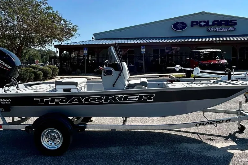 Slide: The Image of 2026 Tracker Bass Tracker Classic CC boat on trailer at dealership. - 3