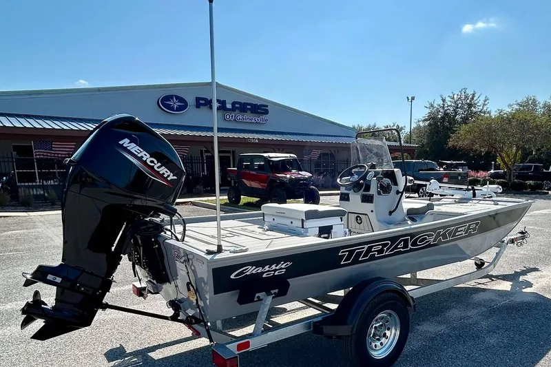 Slide: The Image of 2026 Tracker Bass Tracker Classic CC boat with Mercury engine at dealership. - 4