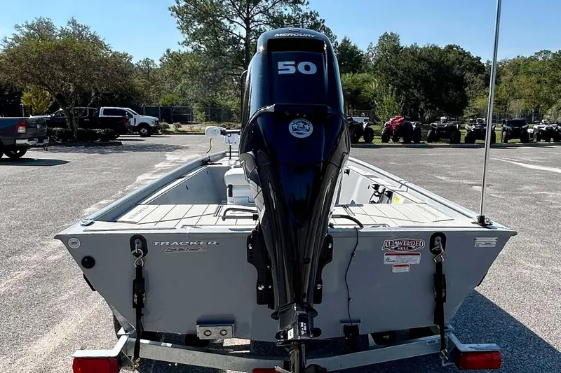 Slide: The Image of 2026 Tracker Bass Tracker Classic CC boat with Mercury 50 engine in parking lot. - 5