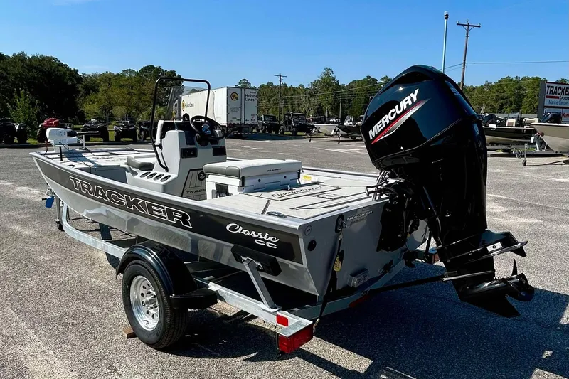 Slide: The Image of 2026 Tracker Bass Tracker Classic CC boat with Mercury engine on trailer. - 6