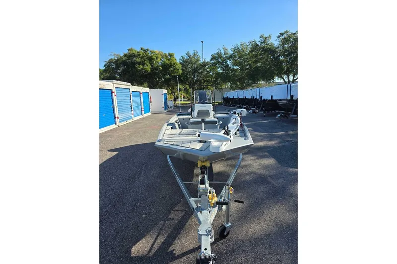 Slide: The Image of 2026 Tracker Bass Tracker Classic CC boat on trailer in storage facility. - 3