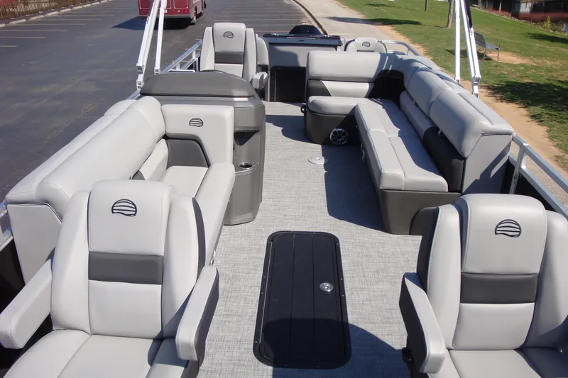 Slide: The Image of 2026 Sun Tracker Sportfish 24 XP3 pontoon boat with spacious seating and modern design. - 97