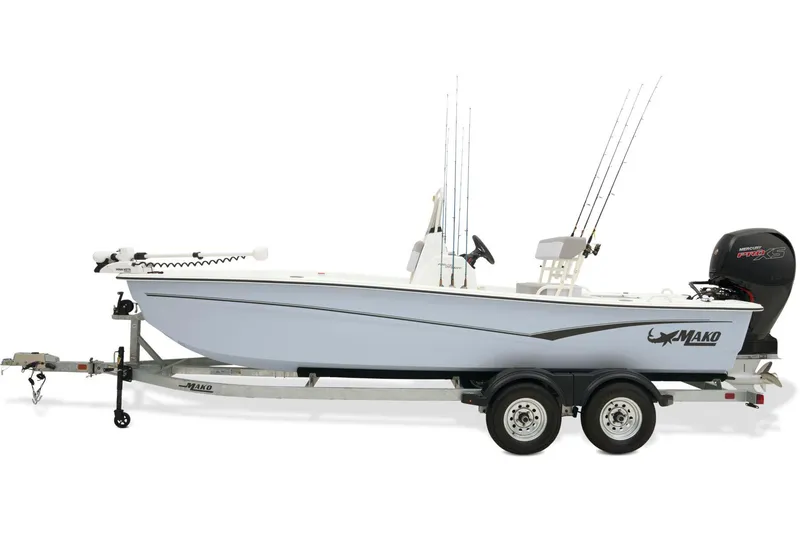 Slide: The Image of 2026 Mako Pro Skiff 19 CC boat on trailer, featuring powerful outboard motor. - 5