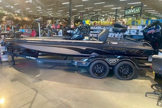 The Image of 2026 Nitro Z19 XL Pro boat displayed in a showroom with accessories. - 0