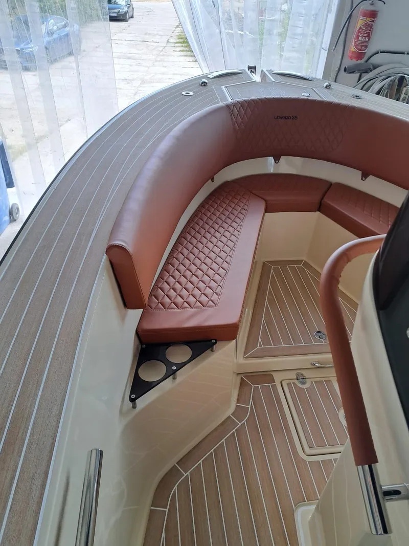 Slide: The Image of Luxurious interior of 2025 Lilybaeum Levanzo 25 Lounge Deck with elegant seating and wood finish. - 11