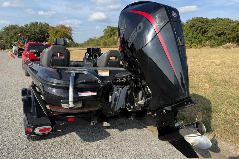 Slide: The Image of 2019 Nitro Z21 Pro bass boat on trailer, parked outdoors. - 10