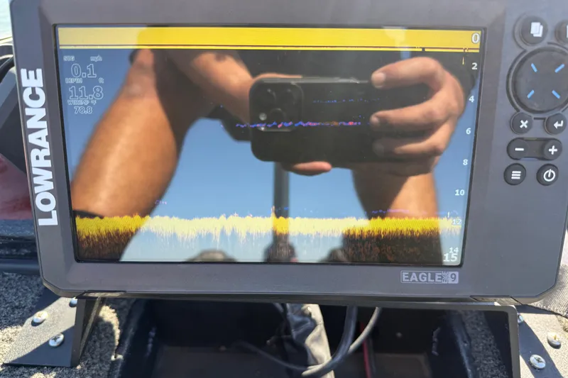 Slide: The Image of Lowrance fish finder display on 2019 Nitro Z21 Pro boat, showing sonar data and reflection. - 101