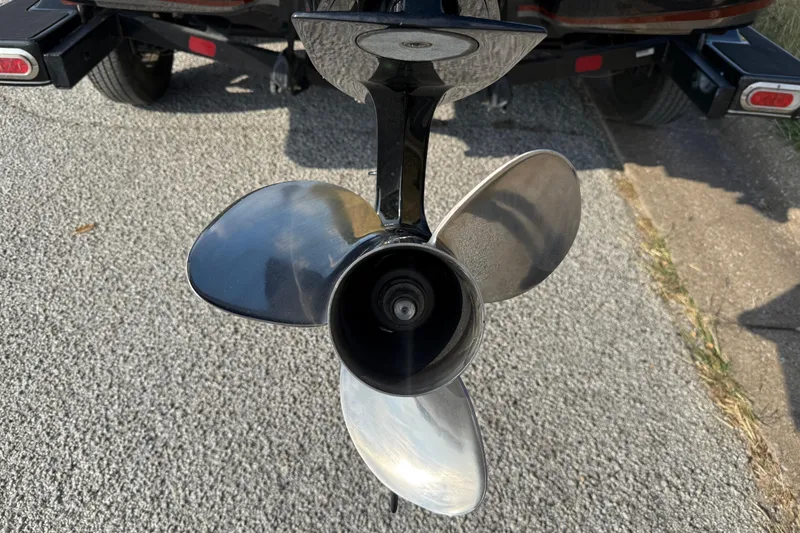 Slide: The Image of 2019 Nitro Z21 Pro boat on trailer, parked outdoors with scenic background. - 12