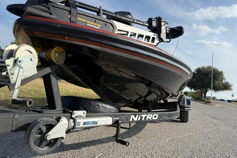 Slide: The Image of 2019 Nitro Z21 Pro boat engine close-up, showcasing hydraulic components and sleek black design. - 20
