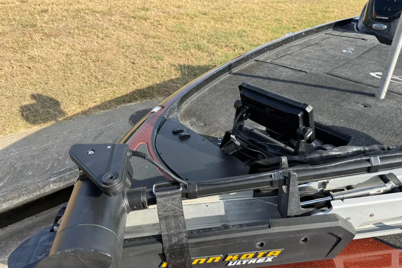 Slide: The Image of Close-up of a 2019 Nitro Z21 Pro tire and suspension on asphalt. - 22