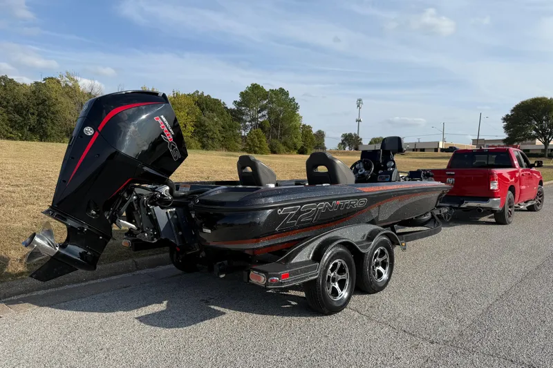 Slide: The Image of 2019 Nitro Z21 Pro boat with powerful outboard motor on a trailer. - 34