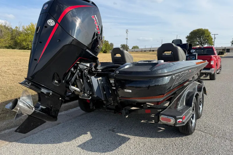 Slide: The Image of 2019 Nitro Z21 Pro boat with powerful outboard motor on a trailer. - 35