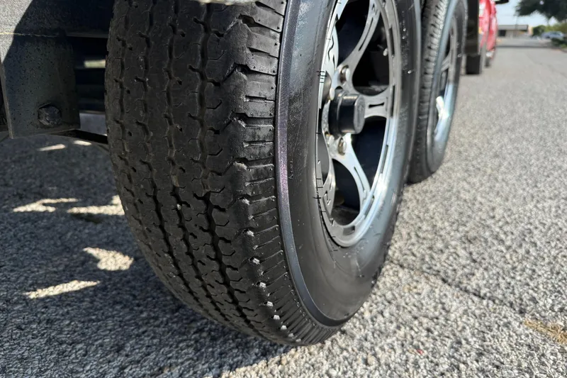 Slide: The Image of Close-up of 2019 Nitro Z21 Pro tire on asphalt road. - 36
