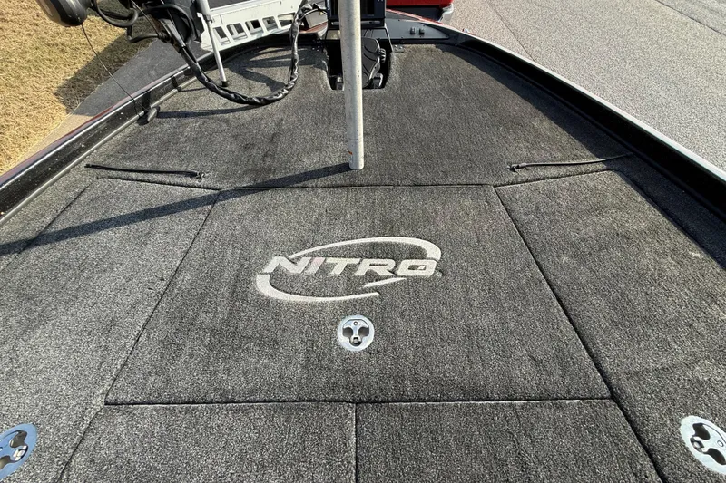 Slide: The Image of 2019 Nitro Z21 Pro boat deck with logo and fishing equipment. - 45