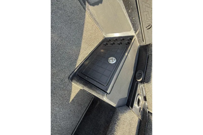 Slide: The Image of 2019 Nitro Z21 Pro boat storage compartment with textured interior. - 52