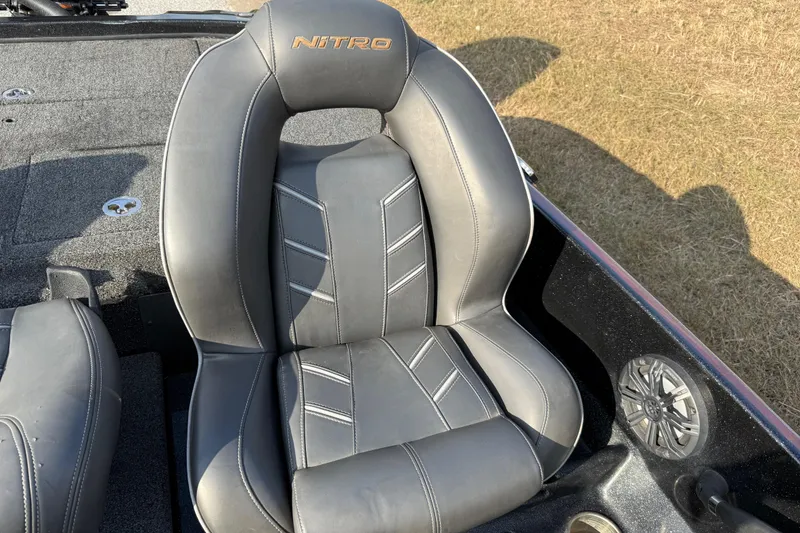 Slide: The Image of 2019 Nitro Z21 Pro boat seat with gray upholstery and embroidered logo. - 54