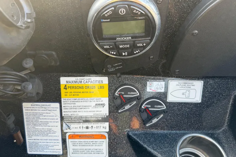 Slide: The Image of Dashboard of a 2019 Nitro Z21 Pro boat with capacity and control labels. - 60