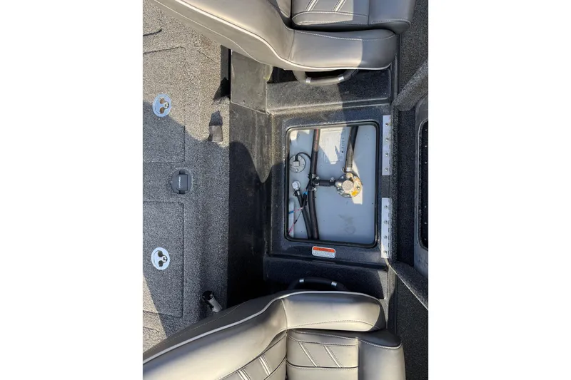 Slide: The Image of 2019 Nitro Z21 Pro boat interior showing storage compartment and seating. - 63