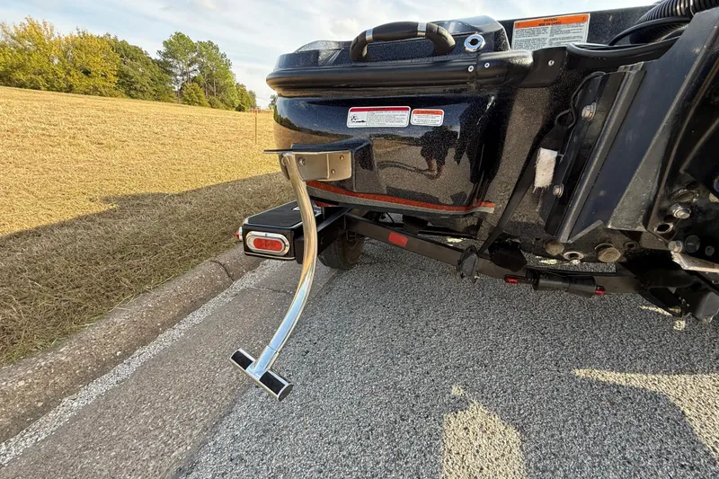 Slide: The Image of Rear view of a 2019 Nitro Z21 Pro boat trailer with step ladder on pavement. - 72