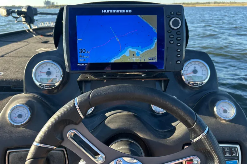 Slide: The Image of Steering wheel and dashboard of 2019 Nitro Z21 Pro boat with Humminbird GPS display. - 73