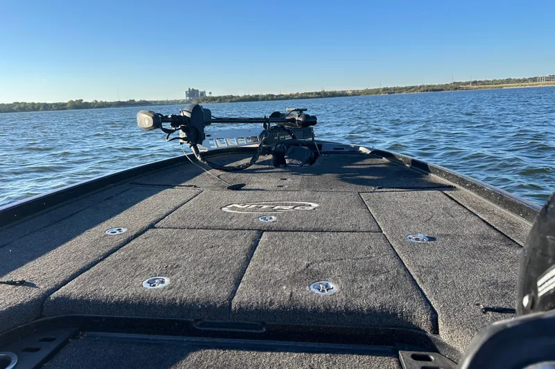 Slide: The Image of 2019 Nitro Z21 Pro boat on a lake, clear sky, calm water. - 74