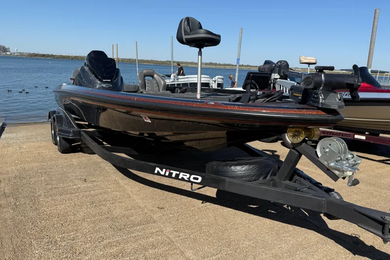 Slide: The Image of 2019 Nitro Z21 Pro boat on trailer by the water, ready for launch. - 79