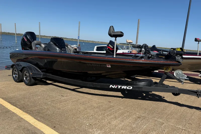 Slide: The Image of 2019 Nitro Z21 Pro boat on trailer by the water, ready for launch. - 80