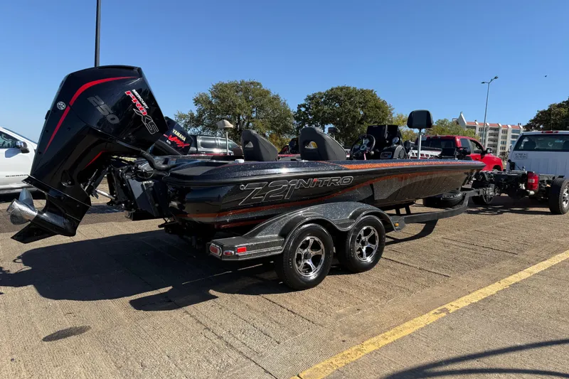 Slide: The Image of 2019 Nitro Z21 Pro boat on trailer with powerful outboard motor. - 82