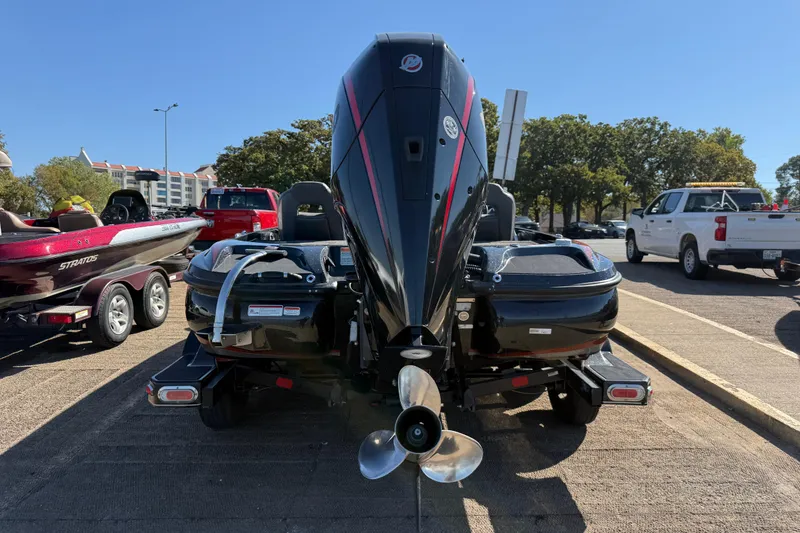 Slide: The Image of 2019 Nitro Z21 Pro boat on trailer, rear view, parked outdoors. - 85