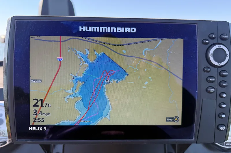 Slide: The Image of Humminbird Helix 9 GPS display on 2019 Nitro Z21 Pro boat, showing lake map and navigation data. - 98