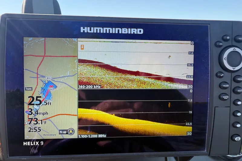 Slide: The Image of Fishfinder display on a 2019 Nitro Z21 Pro boat, showing depth and sonar data. - 99