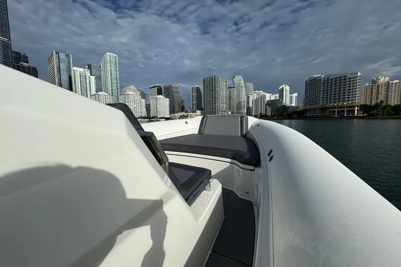 Slide: The Image of Northstar ORION 10 boat cruising near city skyline, 2026 model. - 18